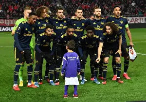 Olympiacos V Arsenal 2019-20 Prints: Arsenal FC's Pre-Match Huddle at Olympiacos: UEFA Europa League Round of 32