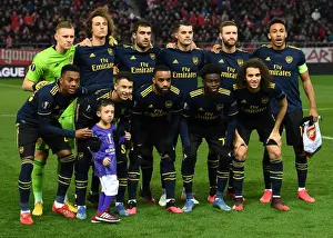Olympiacos V Arsenal 2019-20 Prints: Arsenal FC's Unified Focus: Pre-Match Huddle before Olympiacos Showdown