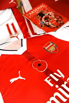 Arsenal Football Club: Poppy-Emblazoned Jerseys in Home Changing Room Before Arsenal vs. Tottenham (2016-17)
