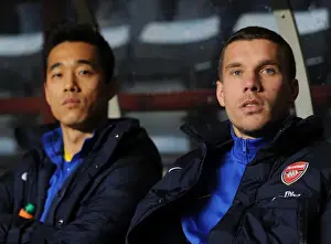 Aston Villa V Arsenal 2013-14 Prints: Arsenal Forwards Chu-Young Park and Lukas Podolski Before Aston Villa Match
