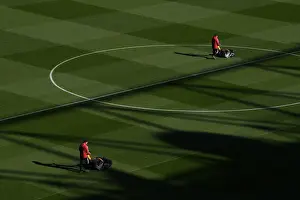 Arsenal V Aston Villa 2021-22 Prints: Arsenal: Gameday Preparation - The Emirates Stadium Groundsmen at Work (2021-22) (Arsenal vs Aston Villa)