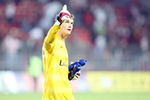 Arsenal goalkeeper Jens Lehmann waves to the fans after the match