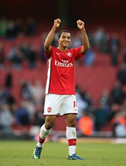 Images Dated 18th October 2008: Arsenal goalscorer Theo Walcott celebrates after the match