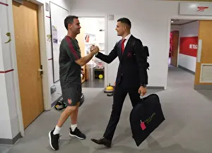 Arsenal: Granit Xhaka and Fitness Coach Shad Forsythe in the Home Changing Room before Arsenal v Brighton & Hove Albion, Premier League