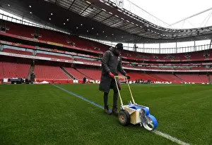 Arsenal V Manchester City 2017-18 Prints: Arsenal Grounds Team Prepares Blue Turf for Arsenal vs Manchester City (2017-18)