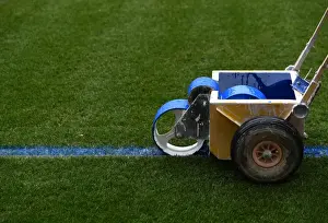 Arsenal V Manchester City 2017-18 Prints: Arsenal Grounds Team Readies Blue Turf for Arsenal vs Manchester City Showdown
