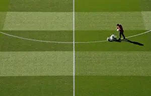 Arsenal V Brentford - Carabao Cup 2018-19 Prints: Arsenal Groundsman Meticulously Prepares Carabao Cup Pitch for Arsenal vs. Brentford