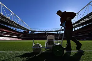 Arsenal V Brentford - Carabao Cup 2018-19 Prints: Arsenal Groundsman Meticulously Prepares Impeccable Pitch for Carabao Cup Showdown against Brentford