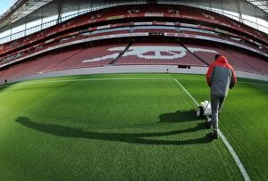 Images Dated 26th December 2016: Arsenal Groundsman Prepares Emirates Stadium Pitch for Arsenal vs West Bromwich Albion (2016-17)