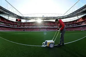 Arsenal Groundsman Prepares Emirates Stadium Pitch for Arsenal vs West Bromwich Albion (2016-17)