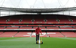Arsenal V Wigan Athletic 2011-12 Prints: Arsenal Groundsman Prepares Emirates Stadium Pitch for Wigan Athletic Clash (2011-12)