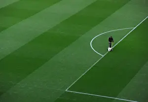 Arsenal V Manchester United 2013-14 Prints: Arsenal Groundsman Prepares Pitch for Arsenal vs Manchester United (2013-14)