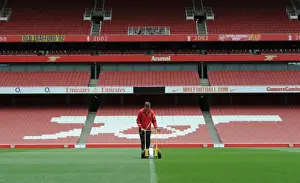 Arsenal V Wigan Athletic 2011-12 Prints: Arsenal: Groundsman Prepares Pitch for Wigan Athletic Clash (2011-12)