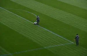 Arsenal V Manchester City 2017-18 Prints: Arsenal Groundstaff Prepare Blue Turf for Premier League Clash against Manchester City