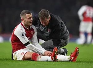 Arsenal V Crystal Palace 2017-18 Prints: Arsenal: Jack Wilshere Receives Treatment from Physio Colin Lewin vs Crystal Palace