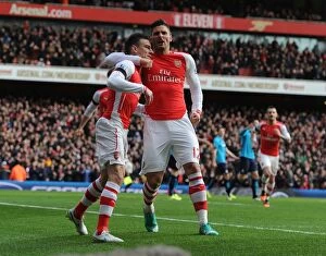 Images Dated 11th January 2015: Arsenal: Koscielny and Giroud's Unforgettable Goal Celebration vs Stoke City (2014-15)