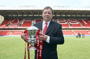Vic Akers the Arsenal Ladies manager with the FA Cup Trophy