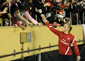 Arsenal Ladies vs. INAC Kobe: A Unified High-Five at Nishigaoka Stadium