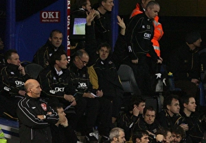 Portsmouth v Arsenal Gallery: Arsenal legend and Portsmouth coach Tony Adams salutes the Arsenal fans during the match
