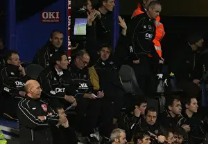 Arsenal legend and Portsmouth coach Tony Adams salutes the Arsenal fans during the match