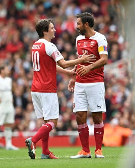 Images Dated 8th September 2018: Arsenal Legends: Rosicky and Pires Reunited - A Glorious Battle against Real Madrid Legends