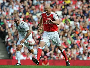 Arsenal Legends V Milan Glorie Prints: Arsenal Legends vs. Milan Glorie: A Battle of Football Legends at Emirates Stadium