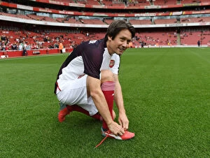 Images Dated 8th September 2018: Arsenal Legends vs Real Madrid Legends: A Clash of Football Icons - Rosicky's Leadership
