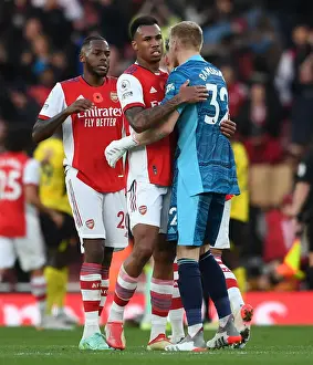 Arsenal: Magalhaes and Ramsdale Embrace Victory After Arsenal v Watford (2021-22)