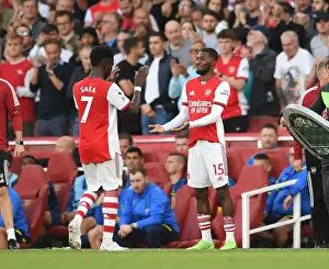 Arsenal: Maitland-Niles and Saka Celebrate Camaraderie Amidst Rivalry - Arsenal vs. Tottenham Hotspur, 2021-22 Premier League