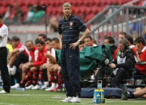 Arsenal v Seville Collection: Arsenal manager Arsene Wenger