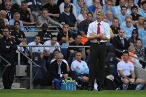 Images Dated 12th September 2009: Arsenal manager Arsene Wenger