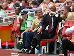 Images Dated 13th August 2007: Arsenal manager Arsene Wenger and assistant Pat Rice