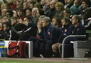 Liverpool v Arsenal 2007-8 Collection: Arsenal manager Arsene Wenger with assistant Pat Rice