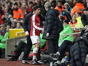 Images Dated 16th February 2009: Arsenal manager Arsene Wenger and Eduardo