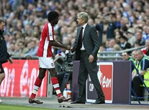 Adebayor Emmanuel Collection: Arsenal manager Arsene Wenger with Emmanuel Adebayor