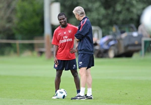 Arsenal manager Arsene Wenger with Emmanuel Frimpong. Arsenal Training Camp Arsenal manager Arsene Wenger with Emmanuel Frimpong. Arsenal Training Camp