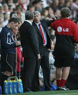 Wenger Arsene Collection: Arsenal manager Arsene Wenger and Fulham manager Roy Hodgson