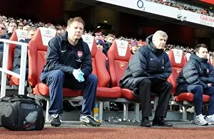 Images Dated 30th January 2011: Arsenal manager Arsene Wenger with physio Colin Lewin. Arsenal 2: 1 Huddersfield Town