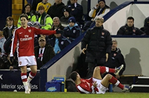 Images Dated 3rd March 2009: Arsenal manager Arsene Wenger and Samir Nasri complain