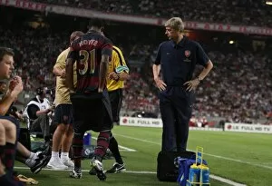 Ajax v Arsenal 2007-8 Gallery: Arsenal manager Arsene Wenger and substitute Justin Hoyte