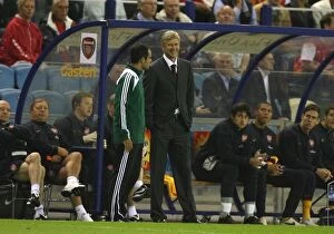 Images Dated 13th August 2008: Arsenal manager Arsene Wenger talks to the 4th Official
