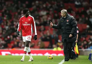 Arsenal V Wigan 2008-9 Prints: Arsenal manager Arsene Wenger talks with Emmanuel Adebayor