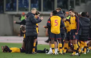 AS Roma V Arsenal 2008-9 Prints: Arsenal manager Arsene Wenger talks with Kolo Toure during extra time