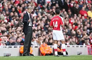 Arsenal v Blackburn Rovers 2008-9 Collection: Arsenal manager Arsene Wenger talks to Theo Walcott