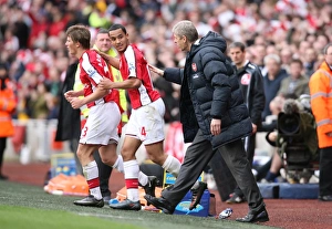 Arsenal v Blackburn Rovers 2008-9 Collection: Arsenal manager Arsene Wenger with Theo Walcott
