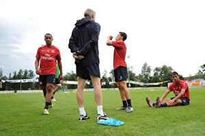 Arsenal manager Arsene Wenger with Theo Walcott and Samir Nasri. Arsenal Training Camp