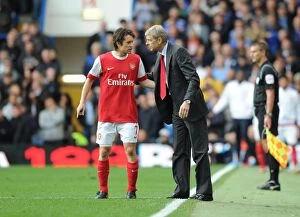 Chelsea v Arsenal 2010-11 Collection: Arsenal manager Arsene Wenger with Tomas Rosicky. Chelsea 2: 0 Arsenal, Barclays Premier League