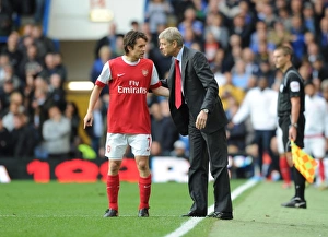 Chelsea v Arsenal 2010-11 Collection: Arsenal manager Arsene Wenger with Tomas Rosicky. Chelsea 2: 0 Arsenal, Barclays Premier League