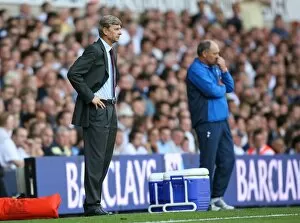 Images Dated 17th September 2007: Arsenal manager Arsene Wenger and Tottenham manager Martin Jol during the match