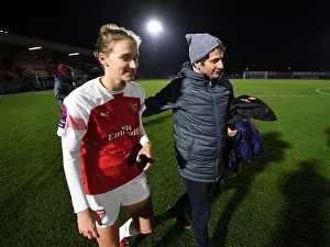Arsenal Manager Joe Montemurro with Vivianne Miedema after the match